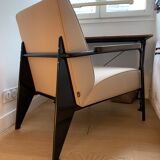 Lounge armchair by Jean Pouvé edited by Vitra