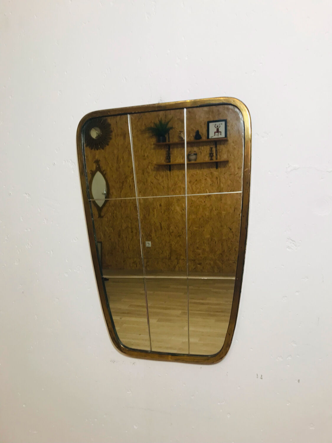 Asymmetrical mirror from the 60s