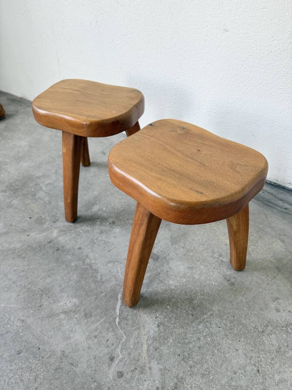 Pair of Henri Bataille oak stools