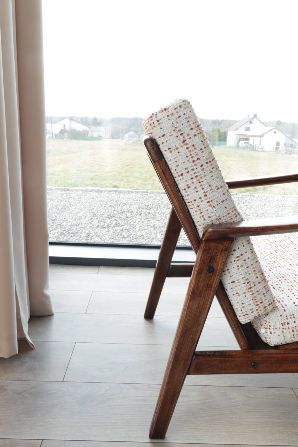 Vintage Danish boucle armchair with orange polka dots from the 1960s.