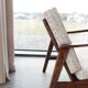 Vintage Danish boucle armchair with orange polka dots from the 1960s.