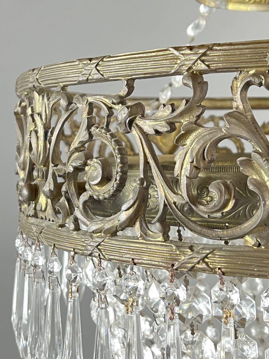 Empire-style chandelier in bronze with crystal pendants, early 20th century.