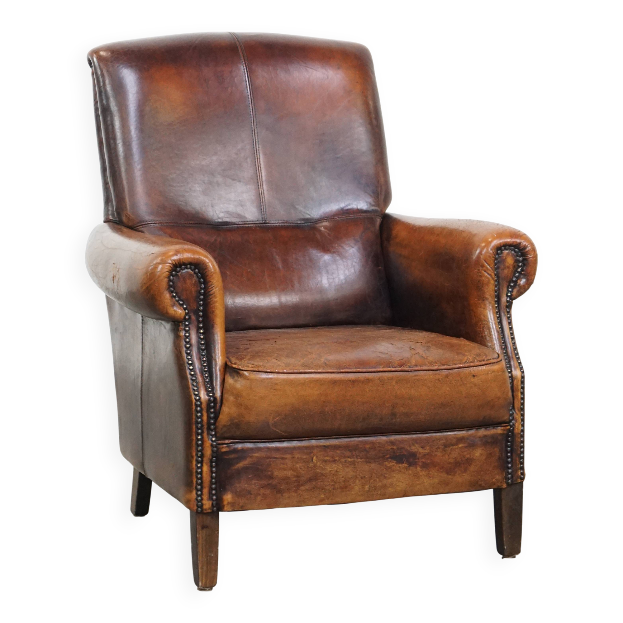 Fauteuil vintage en cuir de mouton avec dossier haut