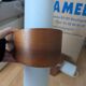 Pair of Louis Kalff NX40 teak and glass wall lights for Philips