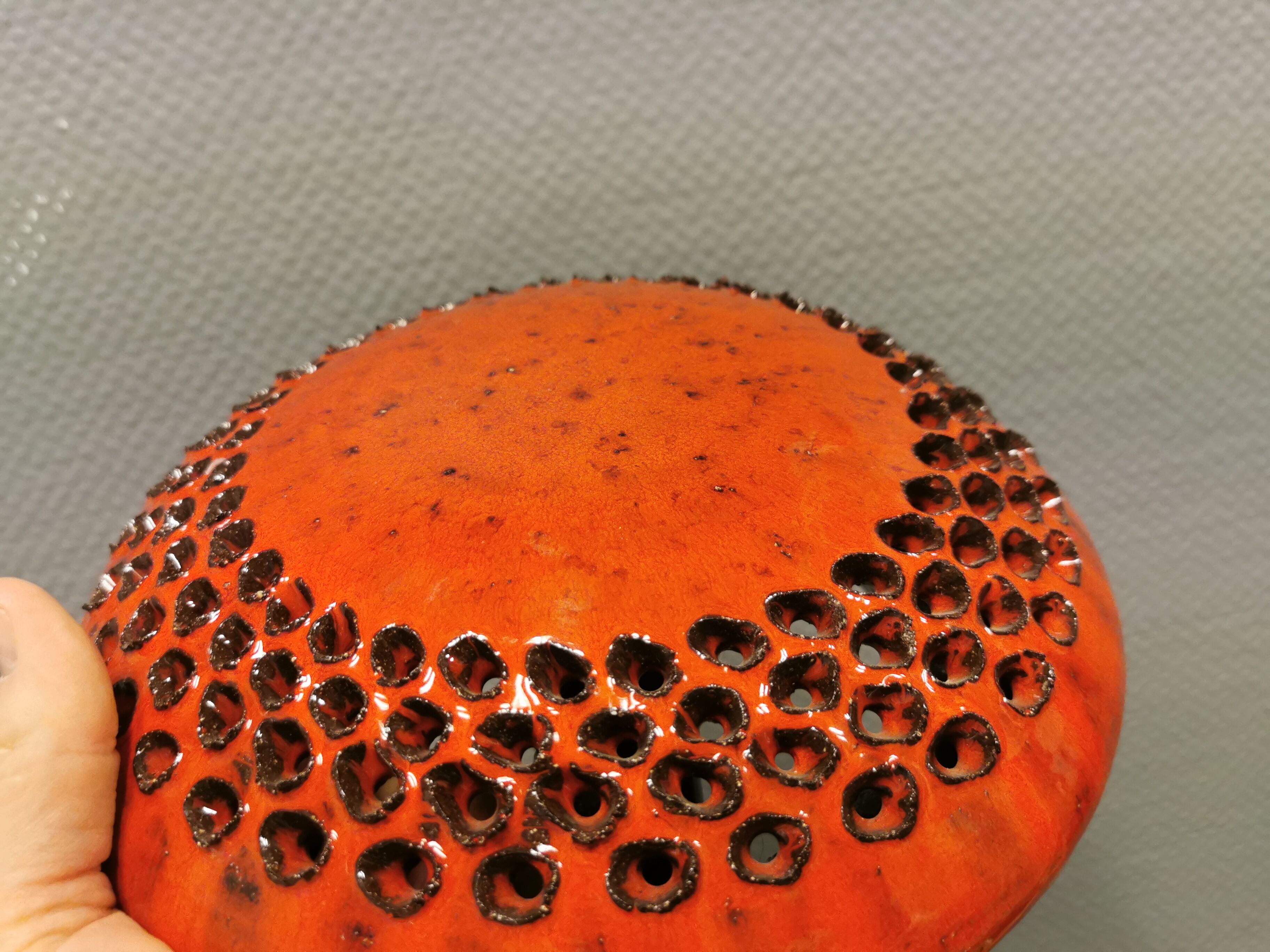 Danish ceramic wall lamp, in nice red glaze. From the 1960s