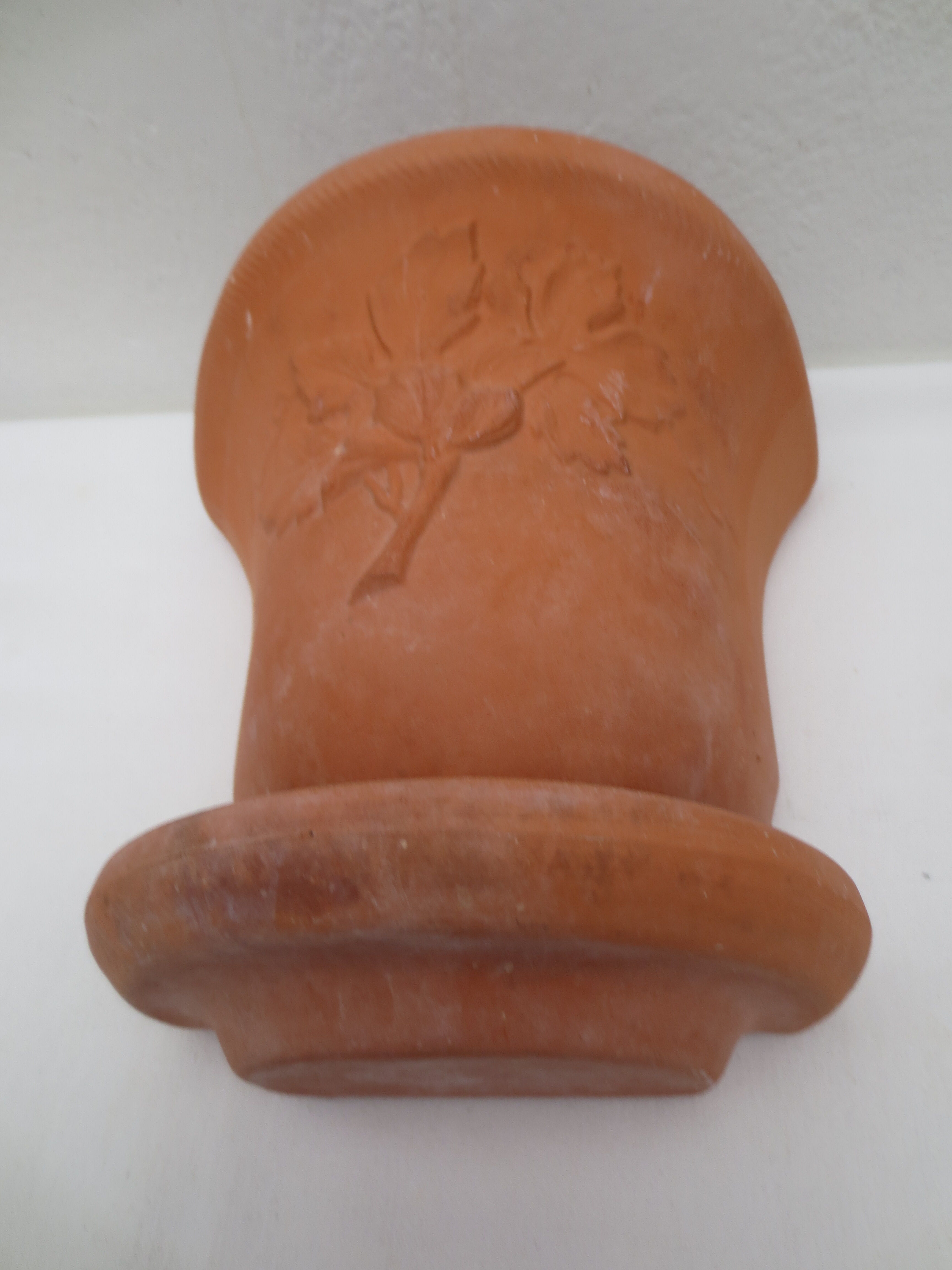 Duo of decorated terracotta wall flowerpots