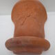 Duo of decorated terracotta wall flowerpots