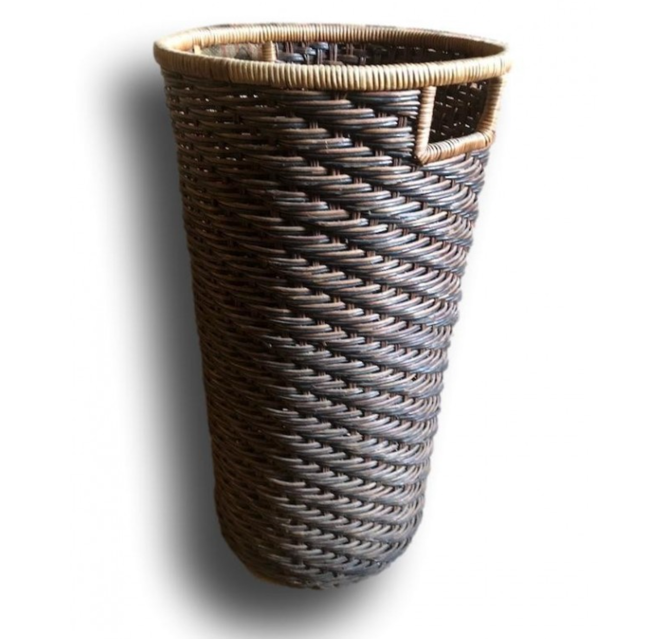 High basket in braided wicker