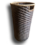 High basket in braided wicker