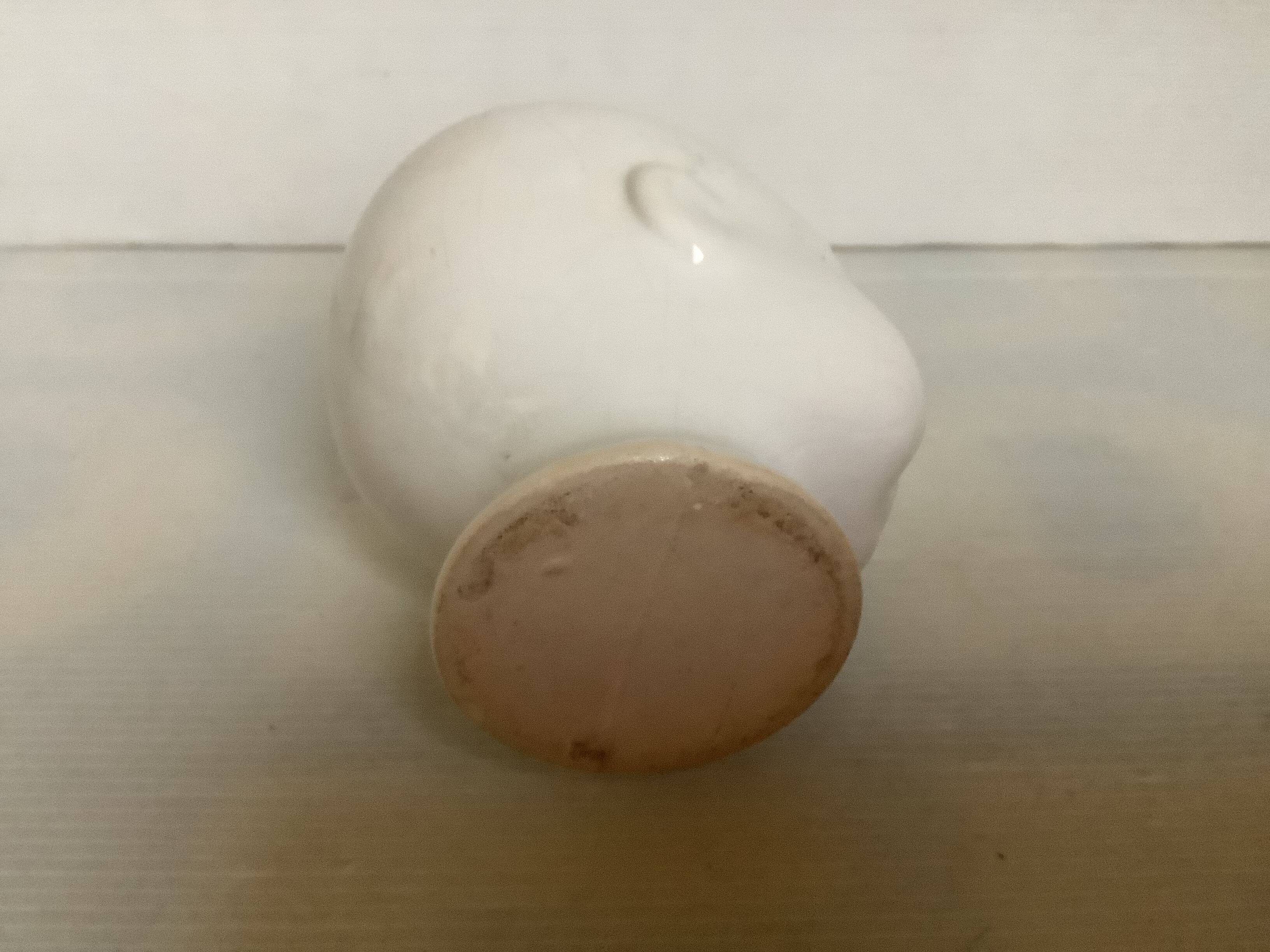 Baby doll shaped vase planter