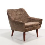 Danish design armchair in brown faux sheepskin