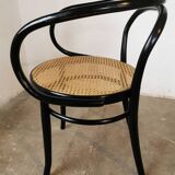 Curved wood and cane armchair called "Le Corbusier"