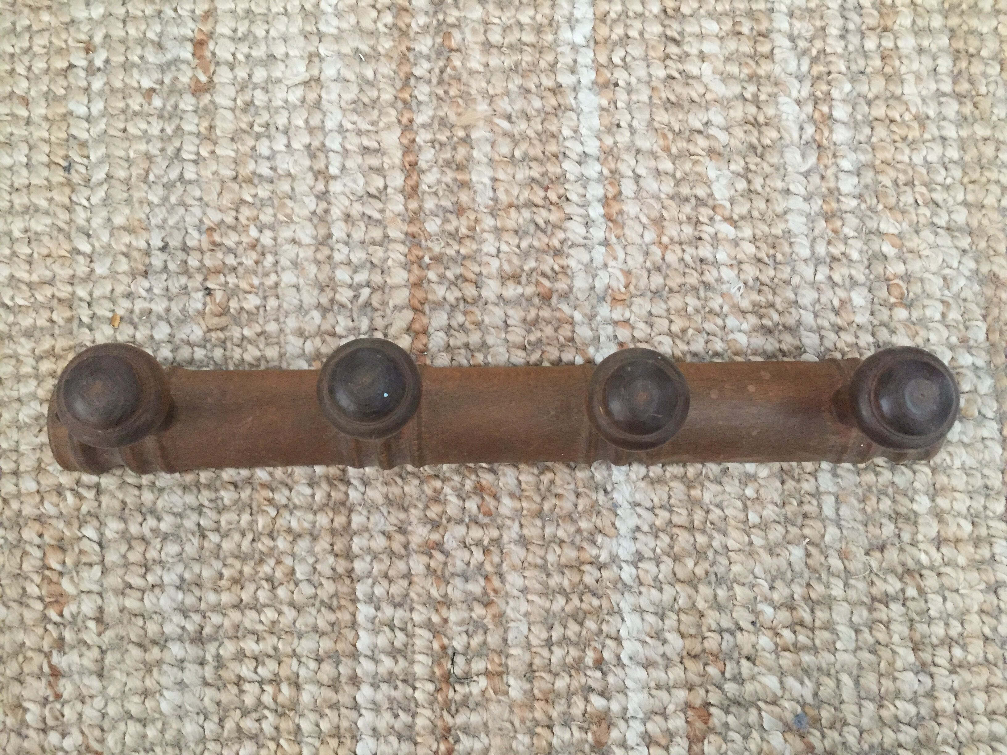 Wooden wall coat rack