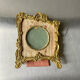 Metal gold colored picture frame brass