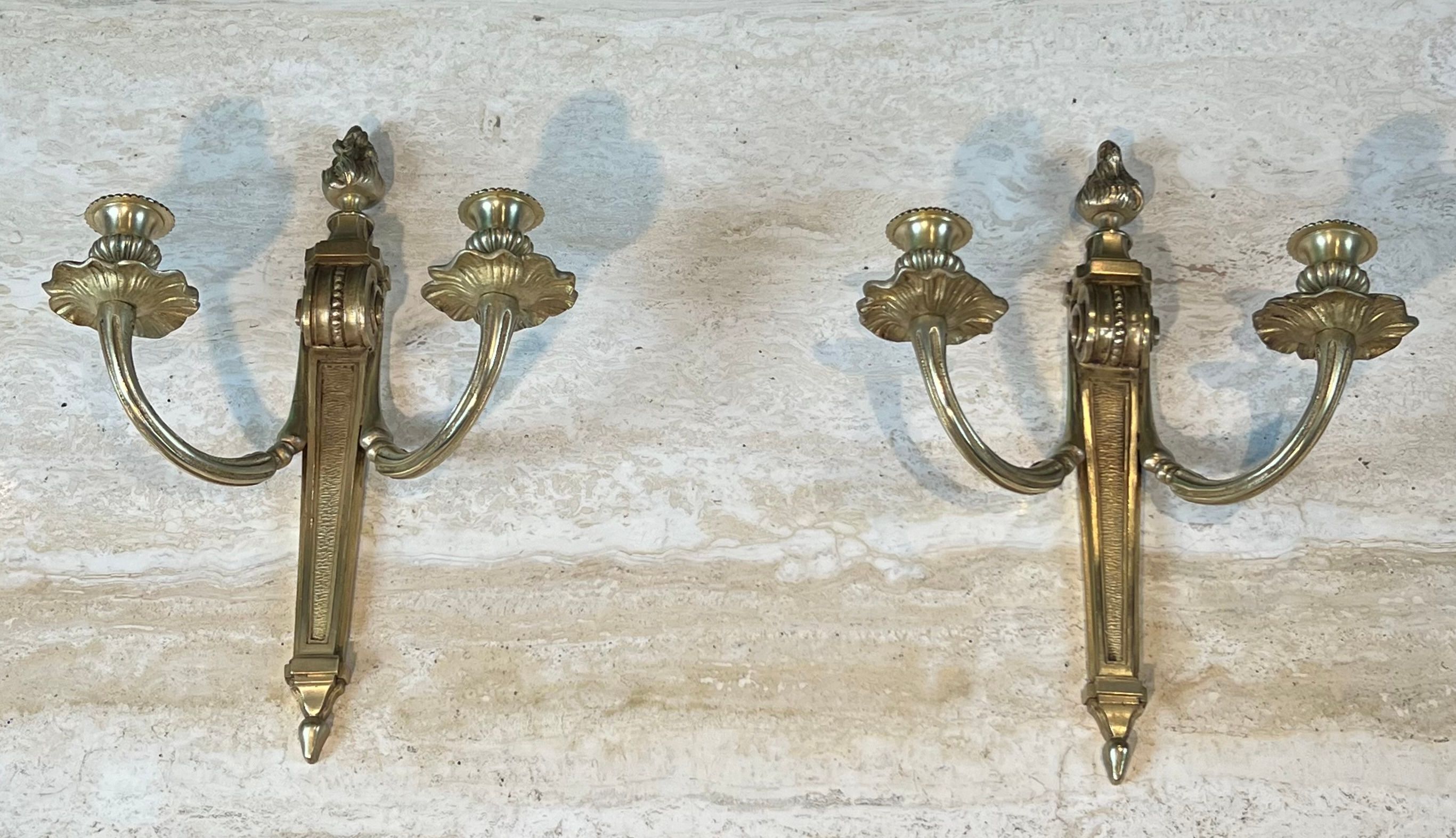 Pair of Louis XVI style bronze wall sconces
