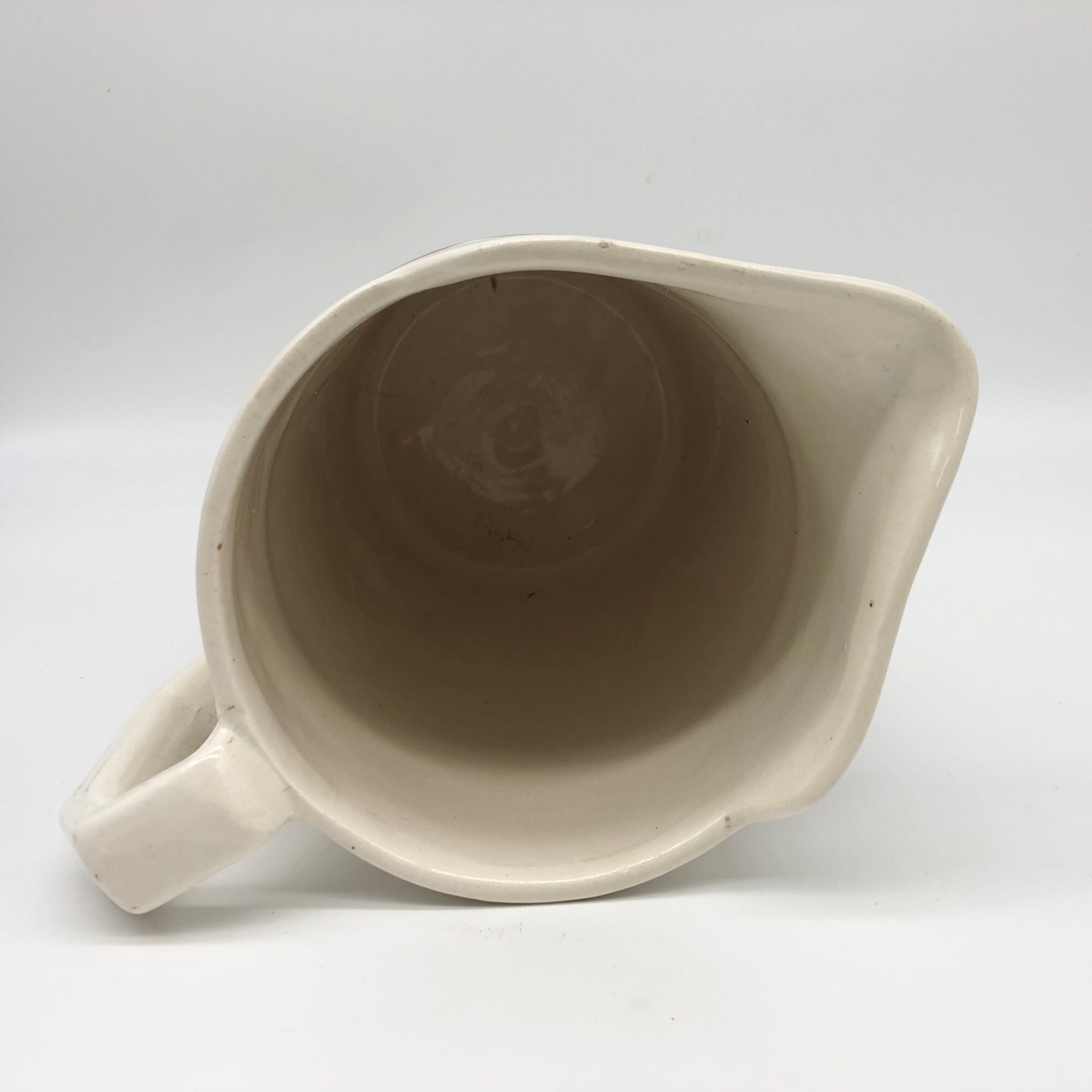 Old ceramic broc stamped "Mado"