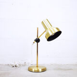 Articulated golden metal table lamp