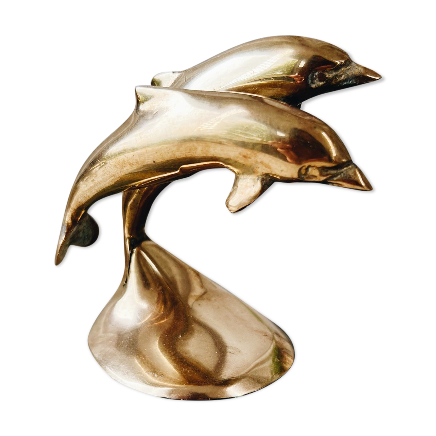 Duo of brass dolphins