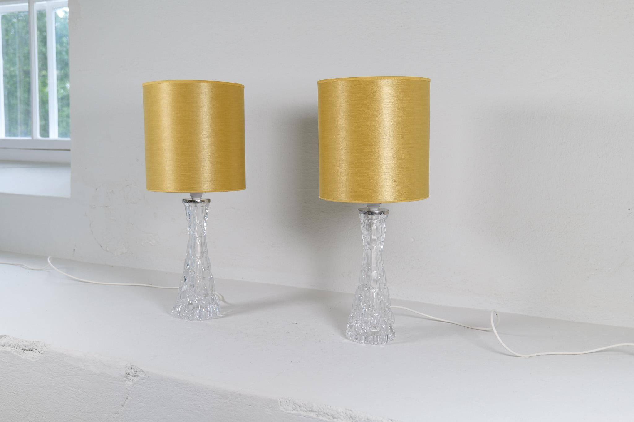 Mid-century modern crystal table lamps by Orrefors, designed by Carl Fagerlund, Sweden, 1970s.