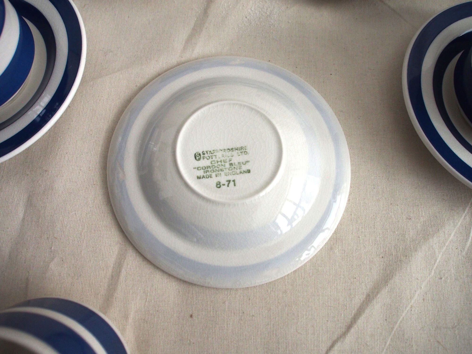 Series of 6 coffee cups in faience with blue stripes with saucers