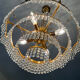 Waterfall chandelier in gilded bronze and crystal tassels
