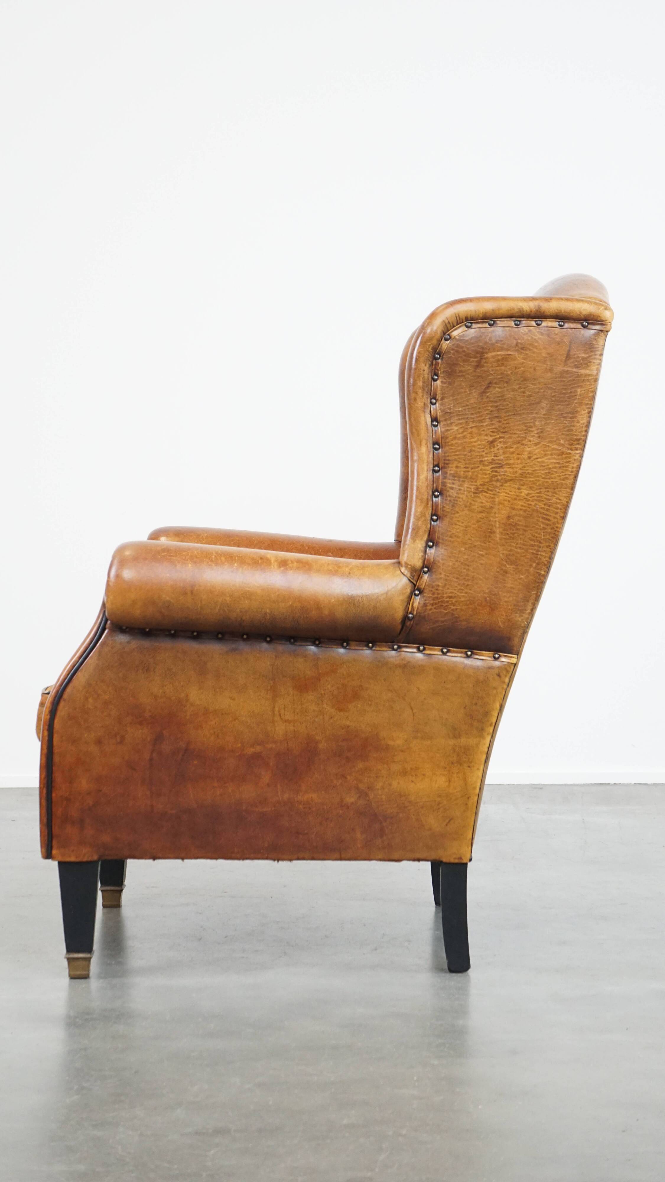 Fauteuil à oreilles en cuir de mouton vintage de style anglais