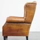 Fauteuil à oreilles en cuir de mouton vintage de style anglais