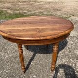 Oval solid oak table with 4 extensions