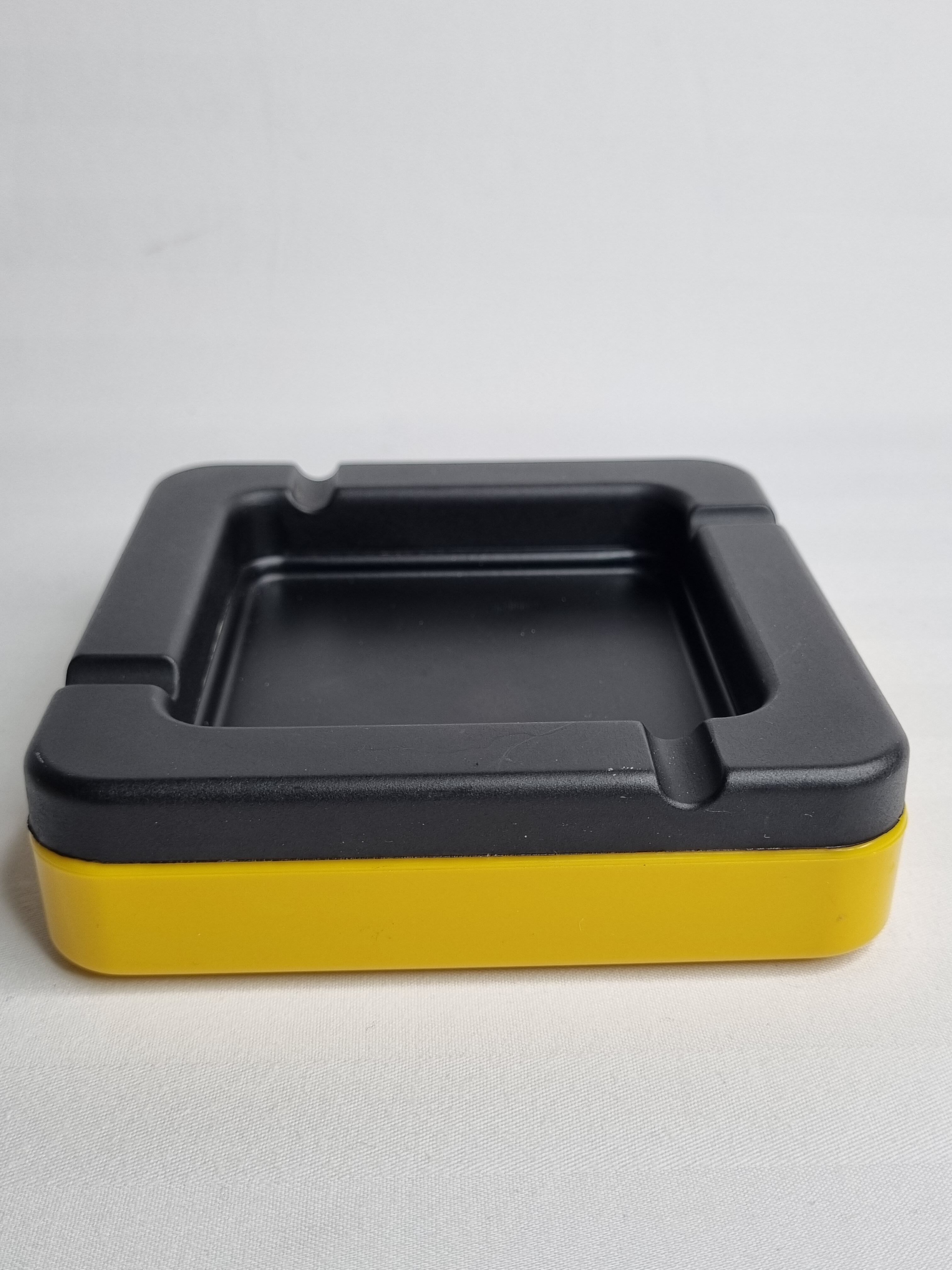Empty pocket ashtray Rexite, studio Erre, two-color, 70s