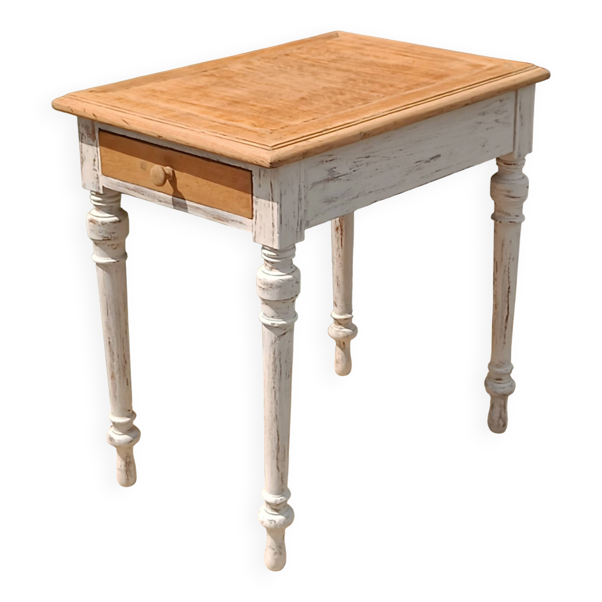 Antique drawer table with a patina.
