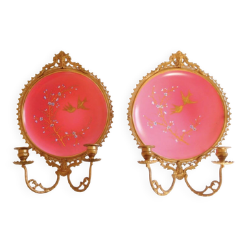 Pair of Napoleon III porcelain and bronze wall lights