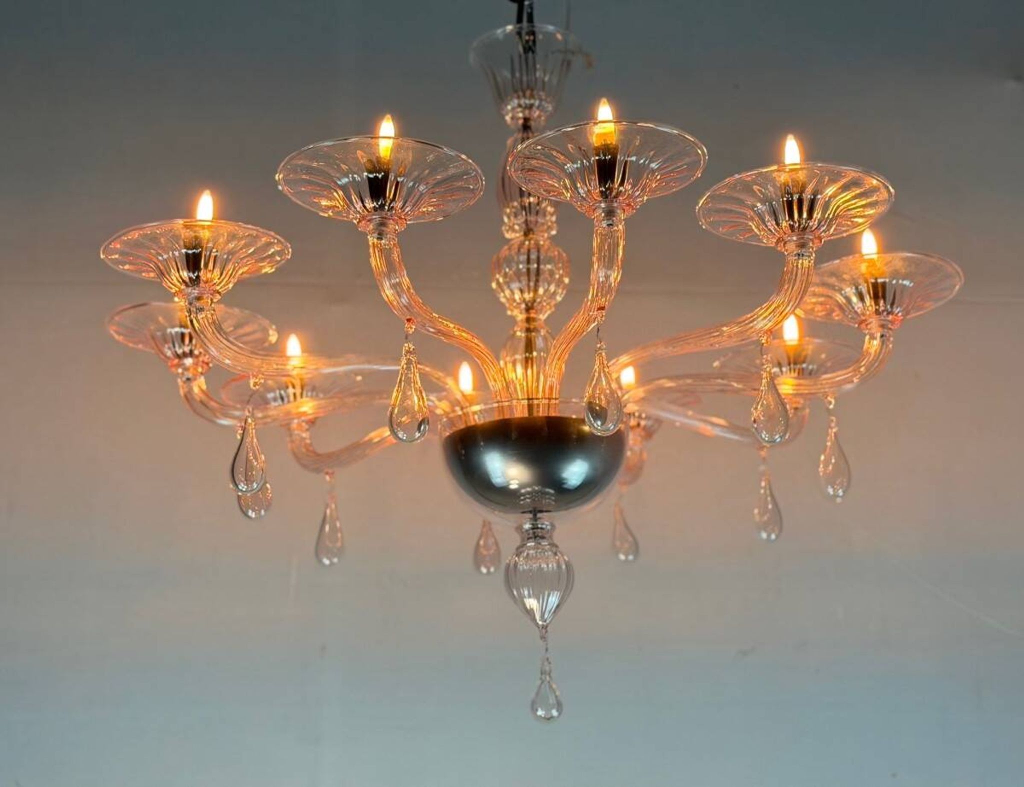 Venetian glass lustre in pink, in the style of Venini.