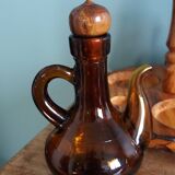 Oil, vinegar, mustard, pepper, salt, olive wood servant from Spain.