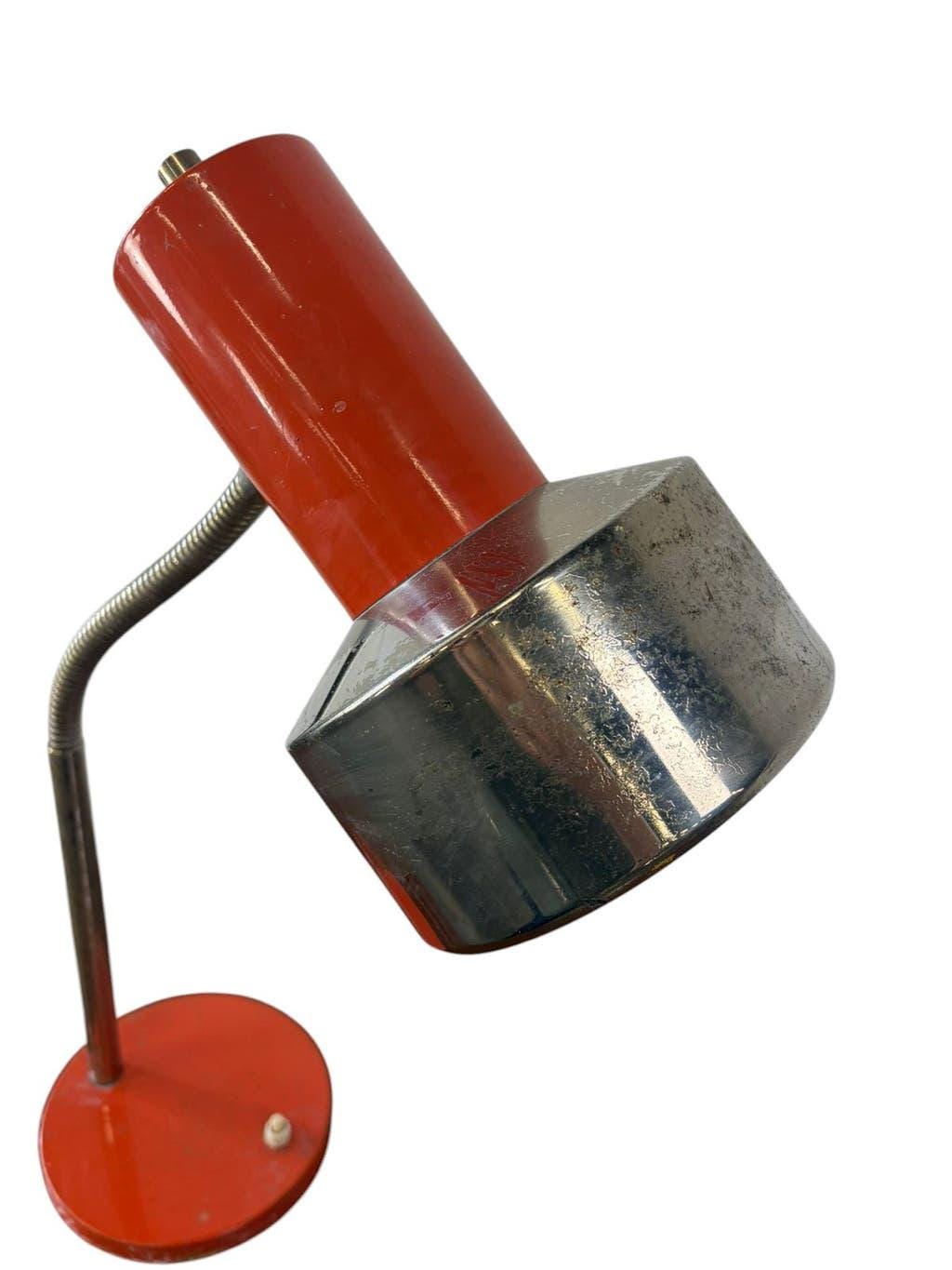 Vintage orange desk lamp with chrome accents.