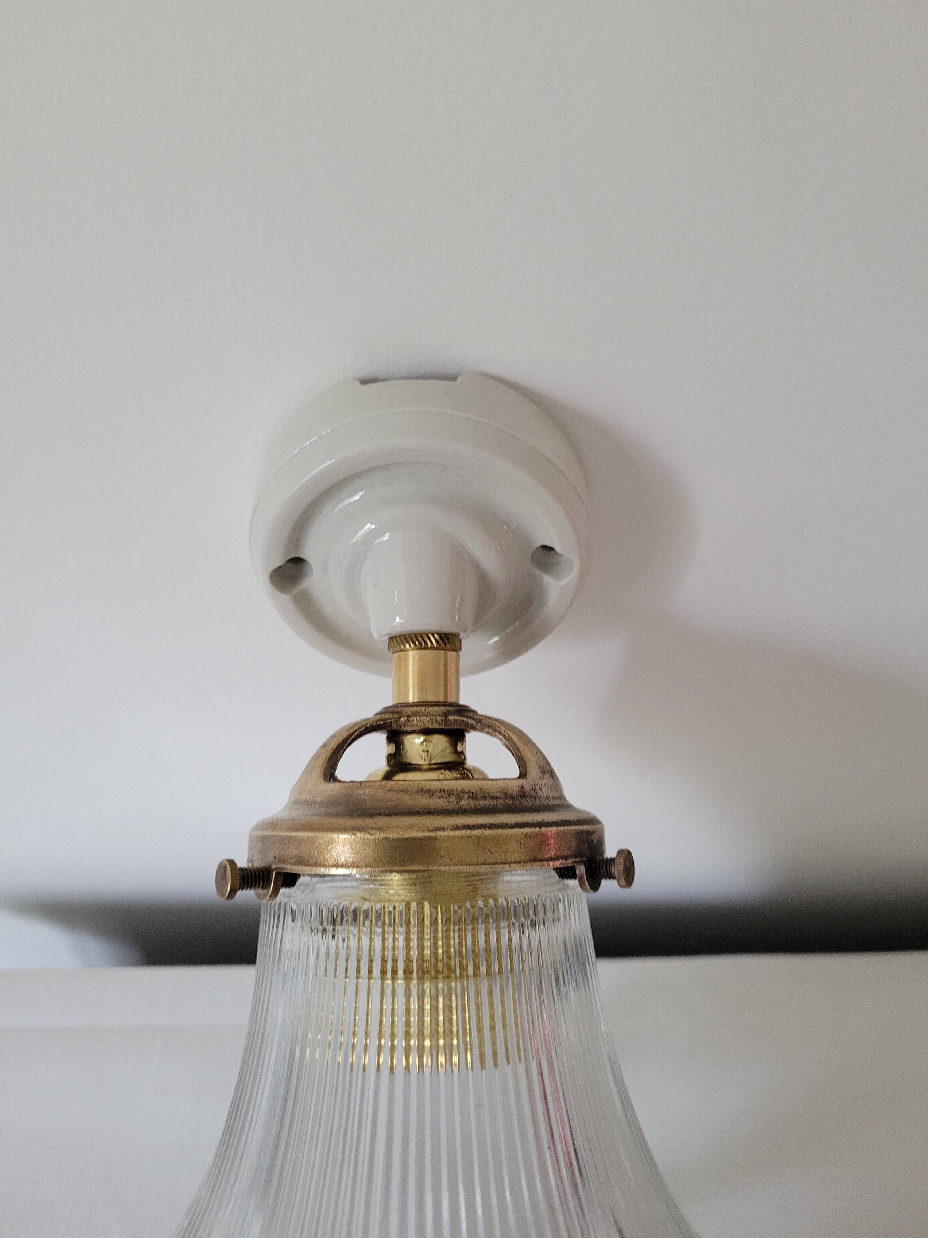 Porcelain wall lamp and Holophane style glass