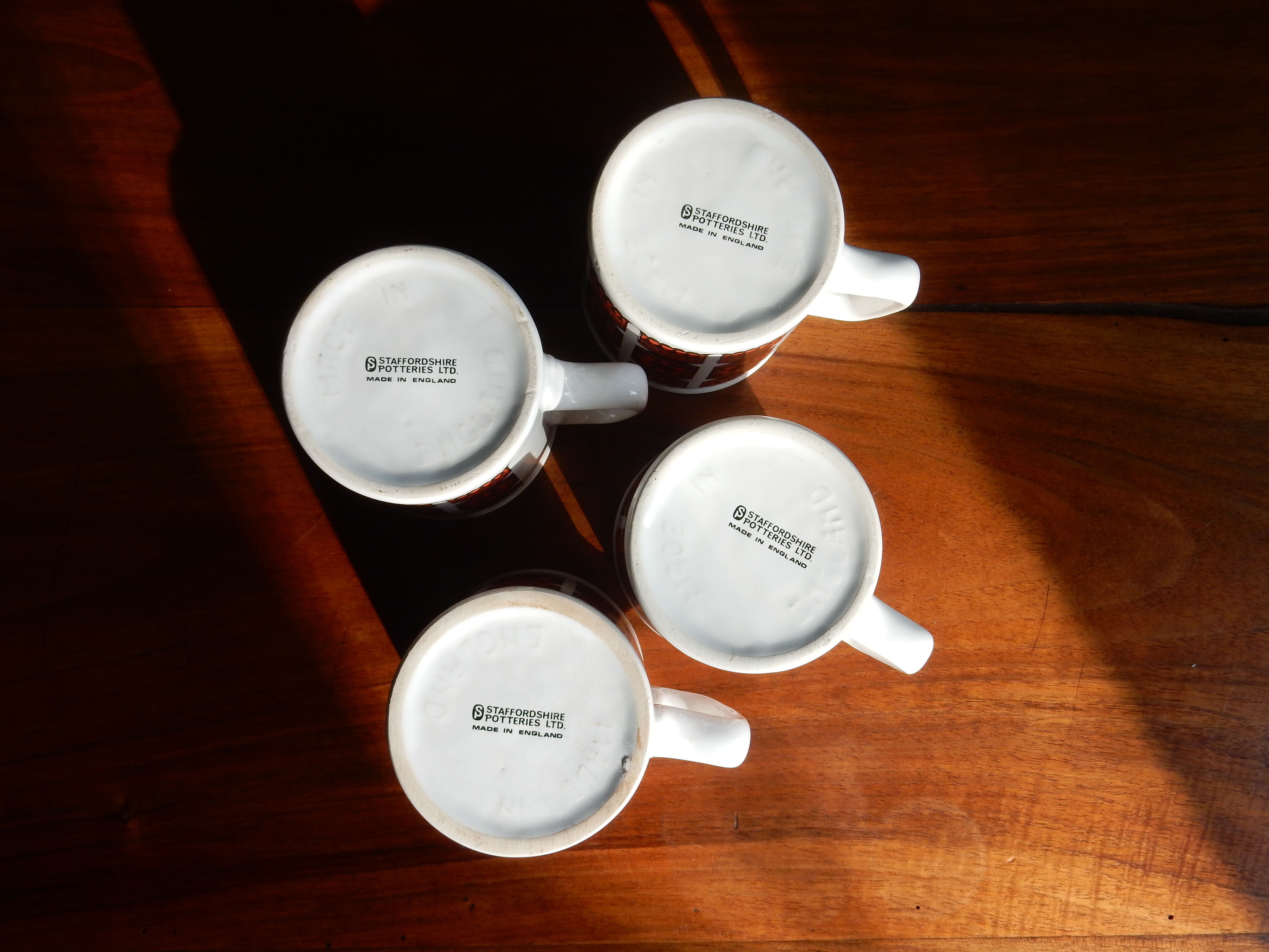 4 Staffordshire pottery ceramic mugs