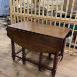 Wooden table with gateleg flaps