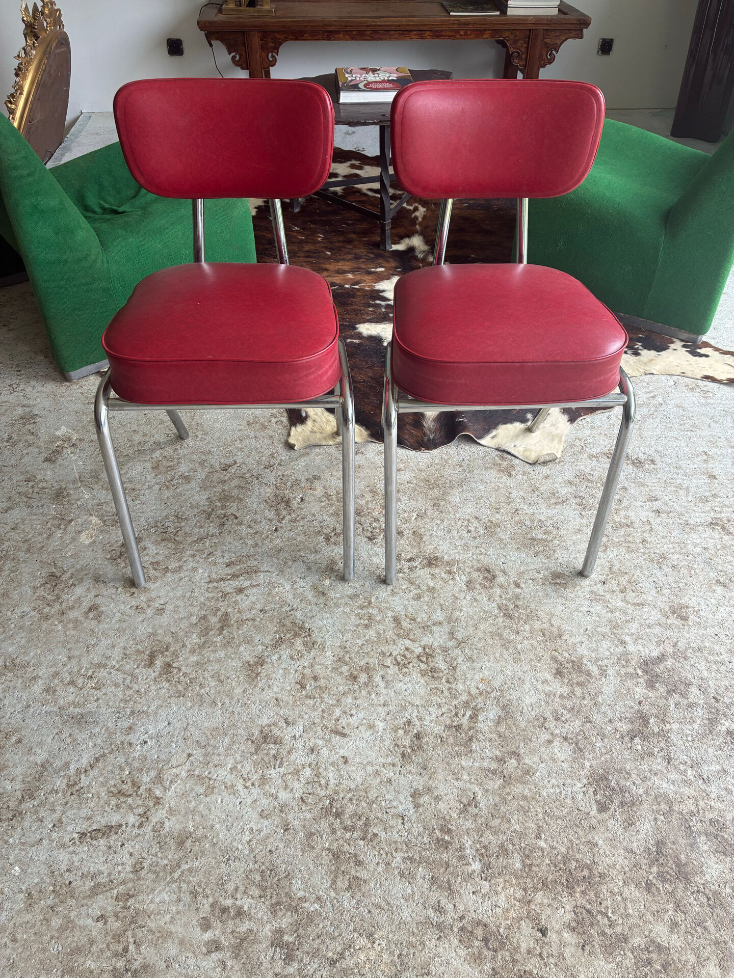 2 vintage red faux leather chairs