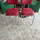 2 vintage red faux leather chairs