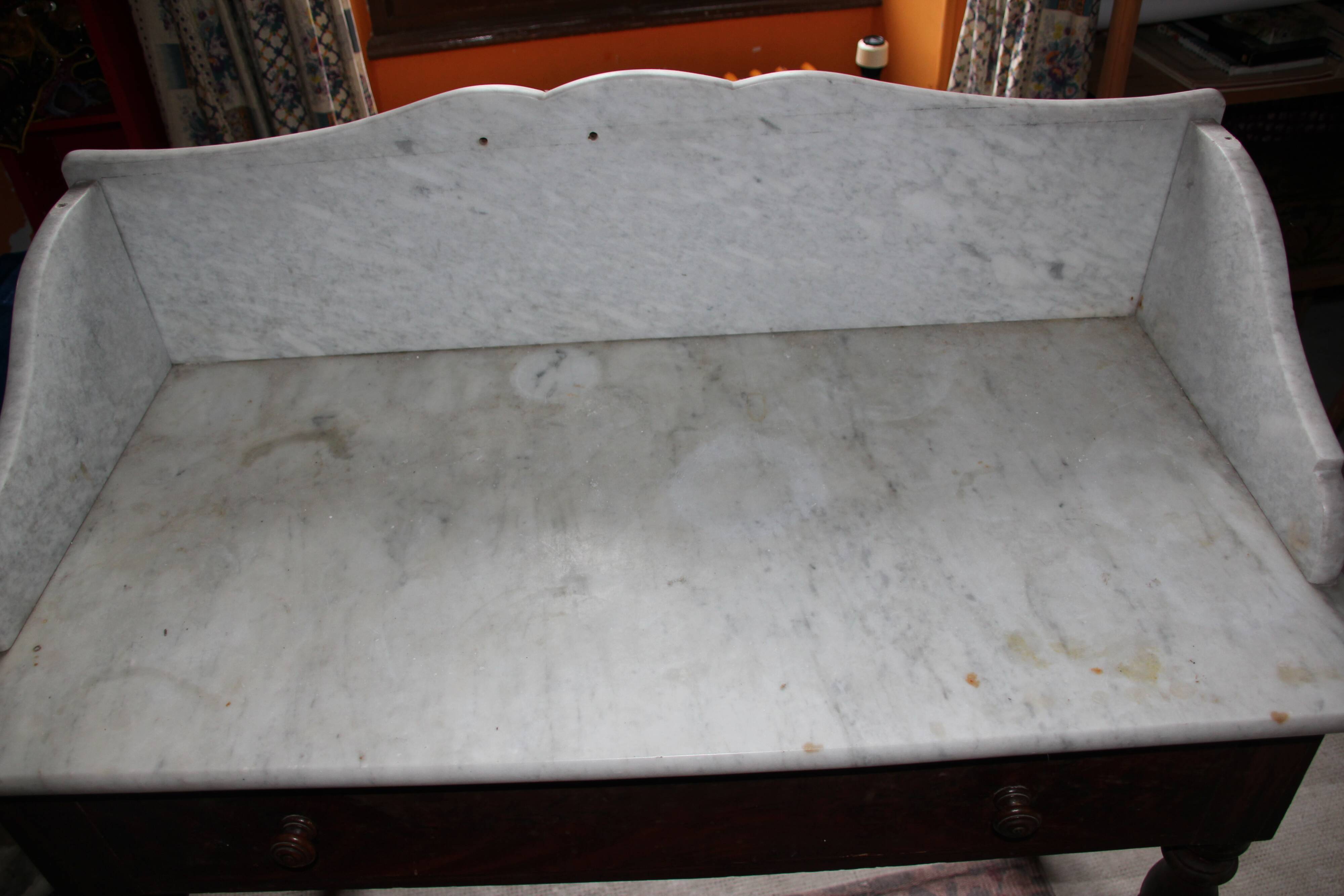 Old wooden and marble toilet table