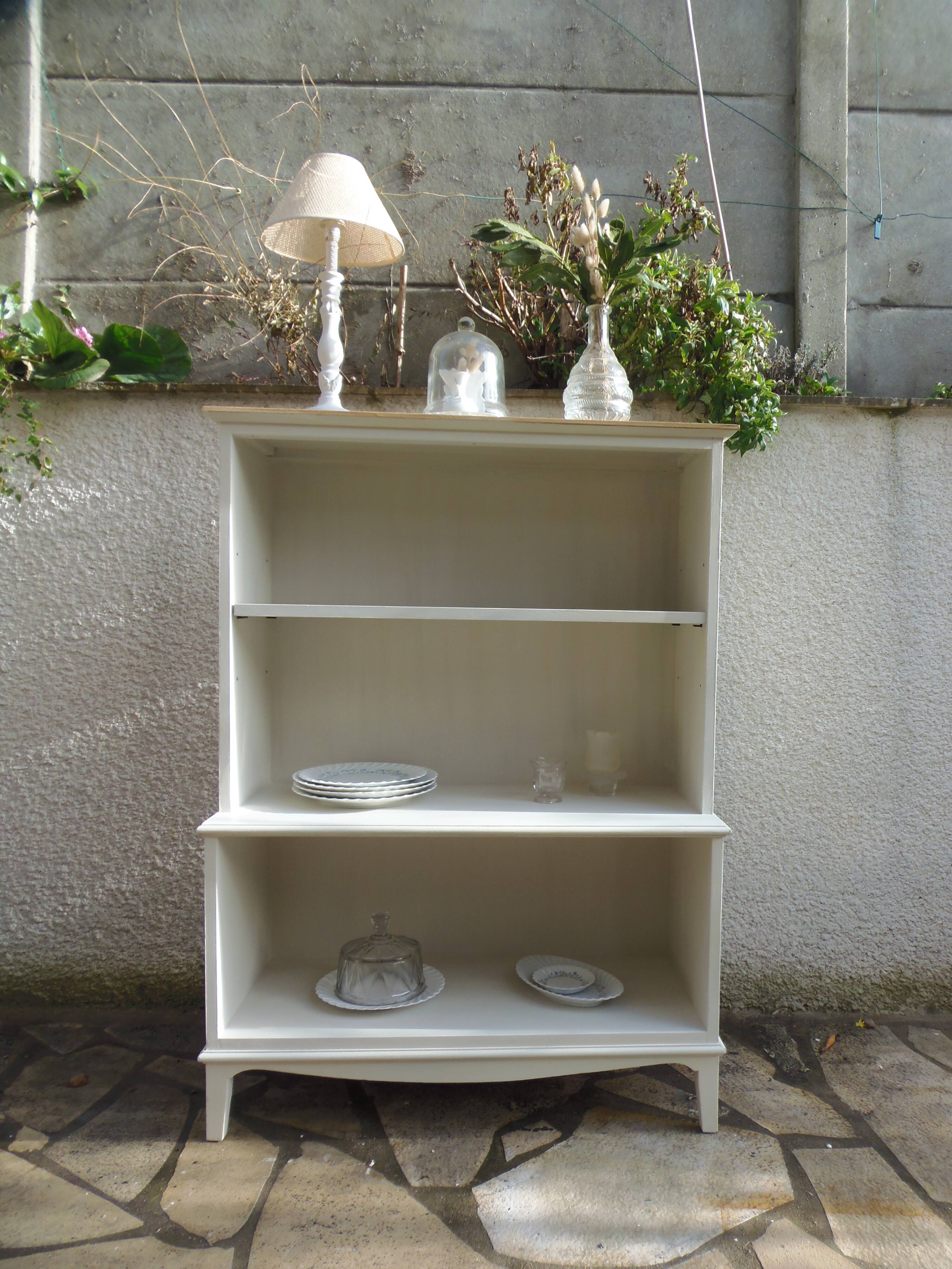 Vintage library enhanced in beige, wooden top.