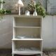 Vintage library enhanced in beige, wooden top.