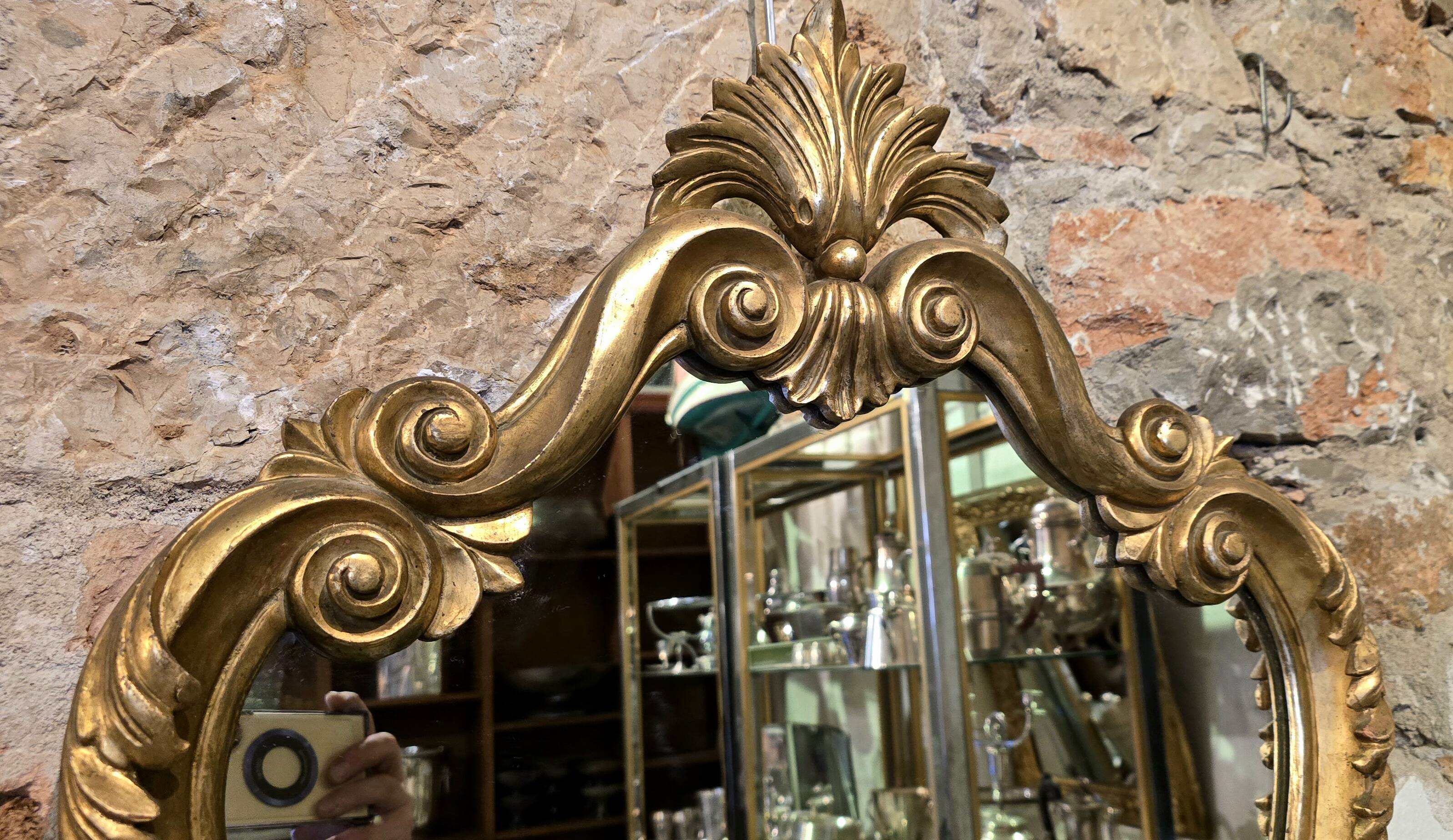 Carved and gilded wooden mirror, Louis XV style - 94 cm