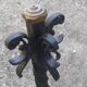 pair of large 20th century metal andirons with mascaron decoration