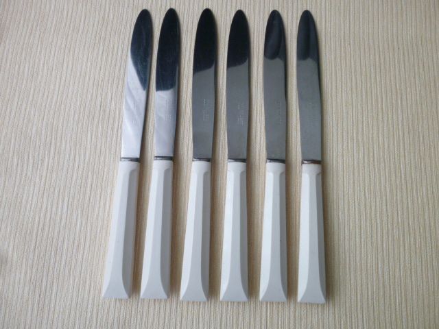 Set of 6 vintage Pradel 255 stainless steel and white bakelite table knives