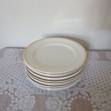 Set of 11 flat white earthenware plates with gold edging