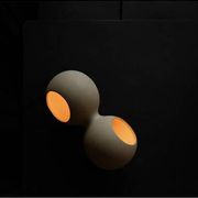 Table lamp or wall lamp in sand color made of ceramic, contemporary work.