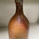 Old sandstone bottle