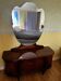 Coiffeuse art deco avec miroir biseauté de forme ovale