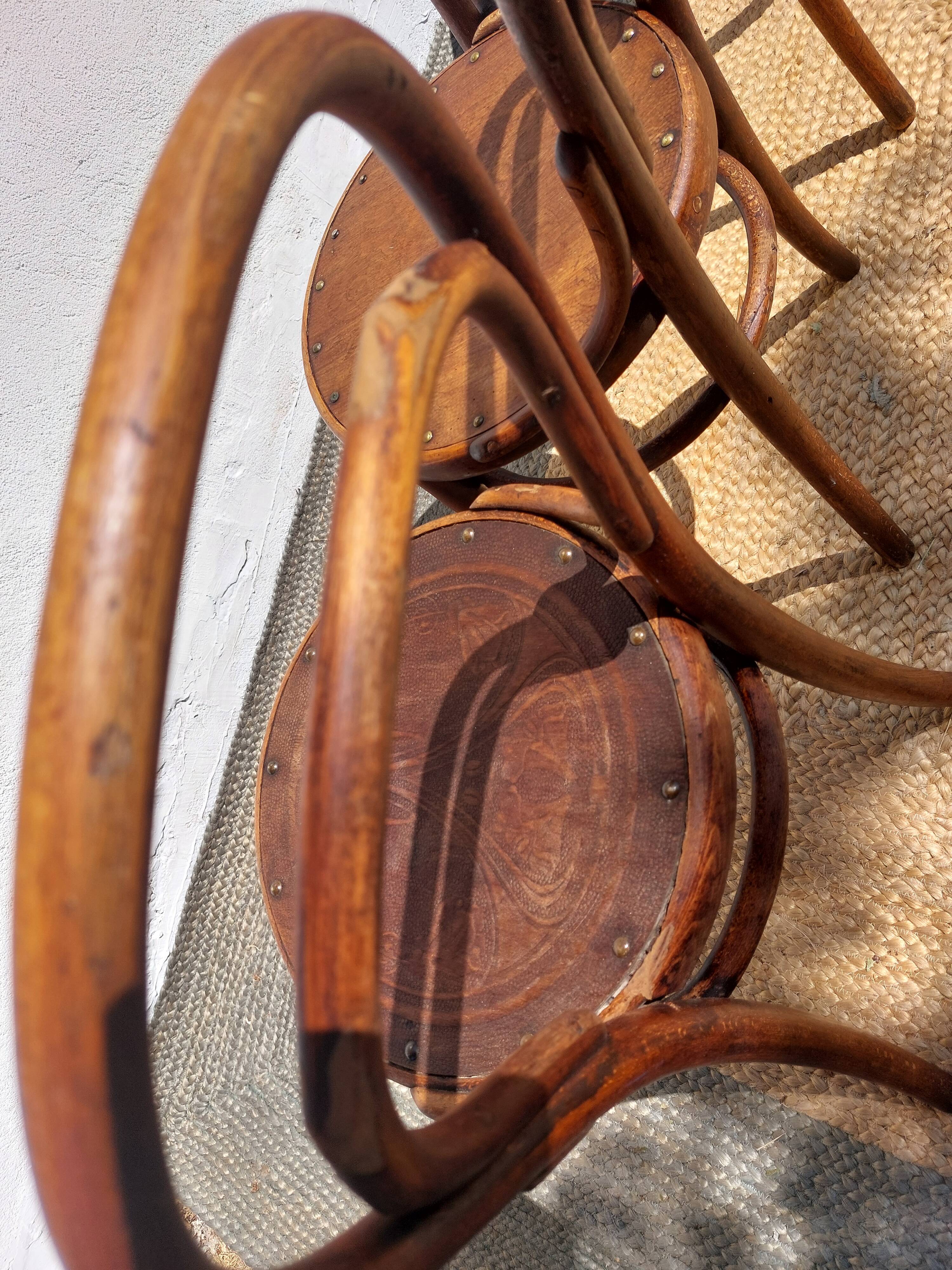 4 curved wooden bistro chairs